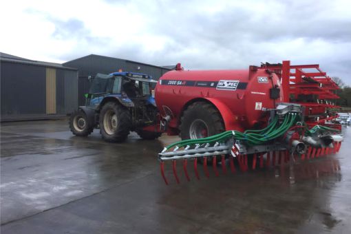 Dribble bar attached to tanker in yard