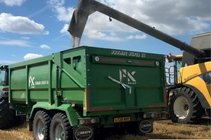 PK Poline grain trailer in use.