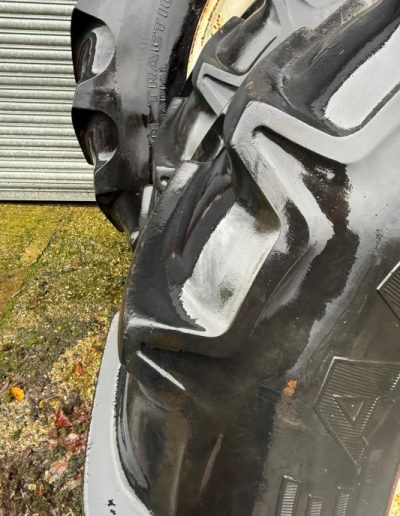 Goodyear 20.8 R42 on 10 stud wheels and a pair of 420/85 R30 on 8 stud wheels